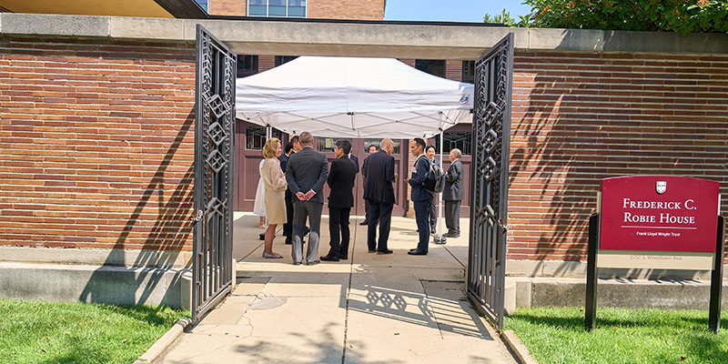 Guests gather in the Robie House courtyard