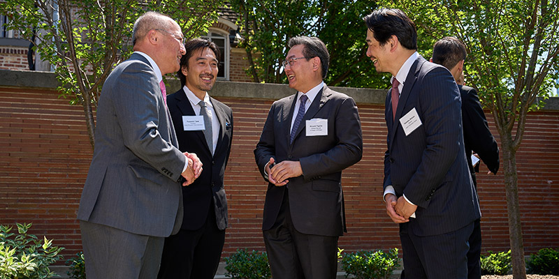 Mr. Sadayasu welcomes architect Tsuyoshi Tane, Consul-General Hiroshi Tajima, and Tsutomu Shibata, Director of the Japan Information Center, Chicago, to the courtyard garden.