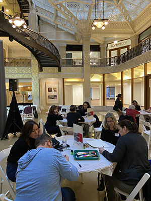 Teachers work on contemporary World’s Fair pavilions in the Light Court of the iconic Rookery building downtown Chicago.