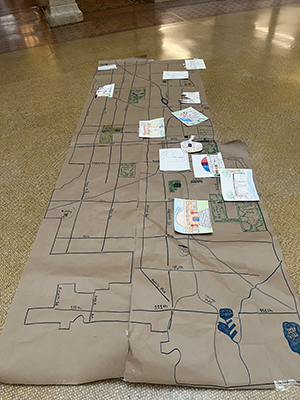 A map of Chicago showcasing all the contemporary World’s Fair pavilions created by educators during a workshop at the Rookery.