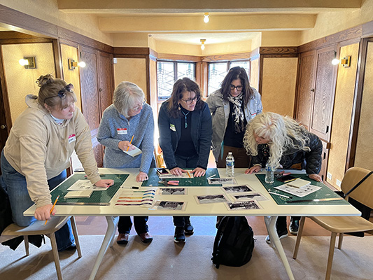 Teachers work together on a timeline activity about the 1893 World’s Columbian Exposition. Much of the World’s Fair was hosted in Hyde Park, just 15 years before Robie House was built.
