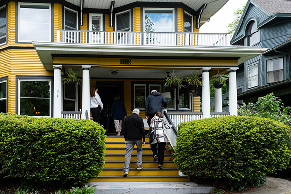 Guests enter the Shapcott/Coumbe House