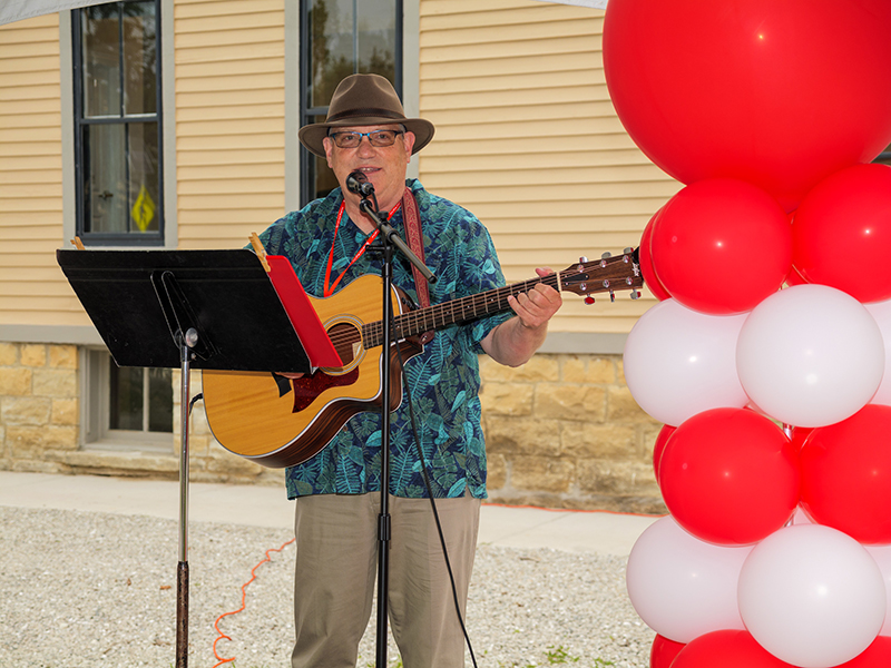 Board Member Jeff Schroeder provided musical entertainment