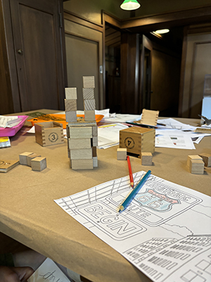 Campers create landmarks with Froebel blocks for an activity about art in public spaces.
