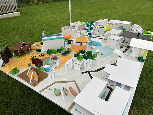 A close-up view of the 6th – 8th graders’ community of architectural models.